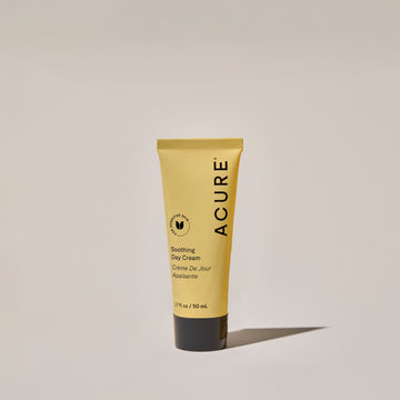 A tube of ACURE Soothing Day Cream against a neutral background.